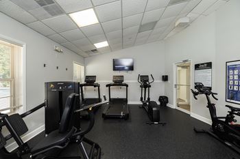 Fitness center with cardio equipment and strength machines